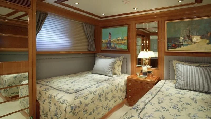 a room with two beds aboard EMELINA Yacht for Sale
