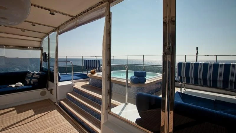 a deck with a pool aboard EMELINA Yacht for Sale