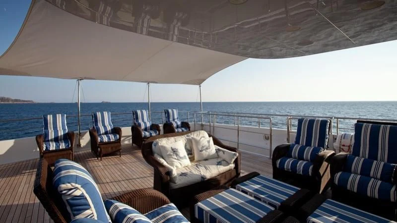 a large boat on the water aboard EMELINA Yacht for Sale