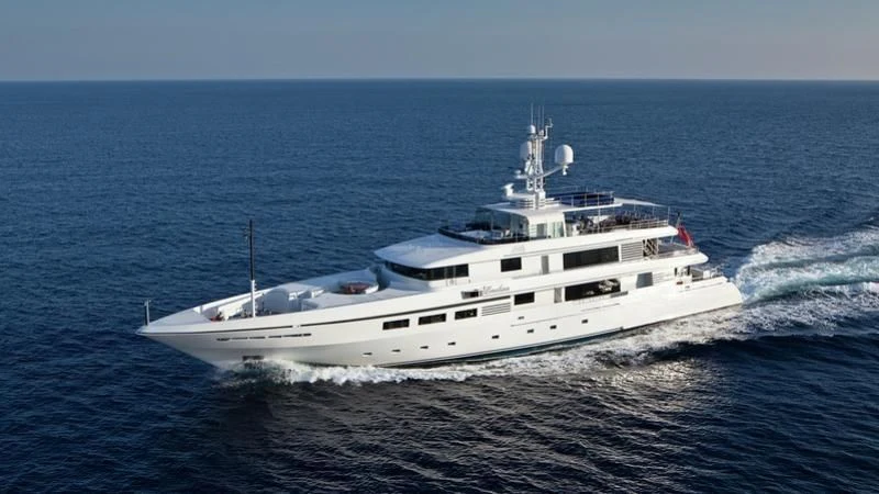 a white yacht on the water aboard EMELINA Yacht for Sale