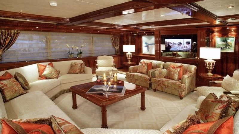 a living room with a large window aboard EMELINA Yacht for Sale