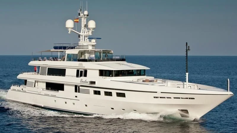 a large white boat in the water aboard EMELINA Yacht for Sale