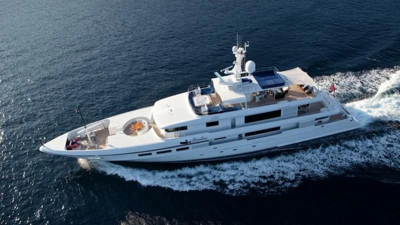 a white yacht on the water aboard EMELINA Yacht for Sale