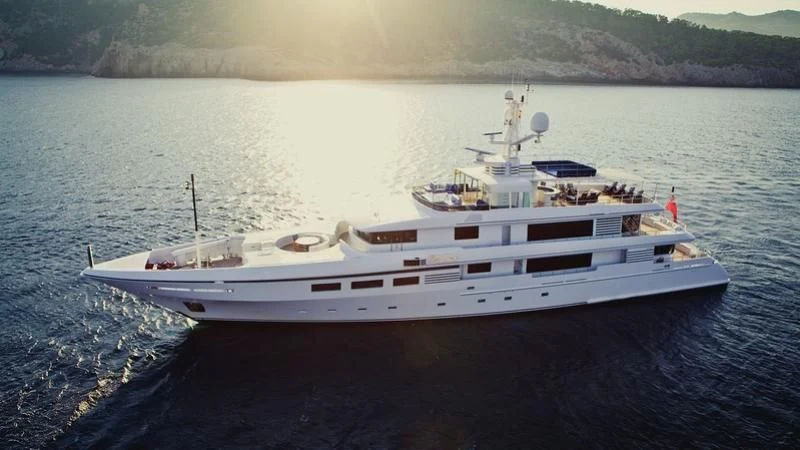a white yacht on the water aboard EMELINA Yacht for Sale
