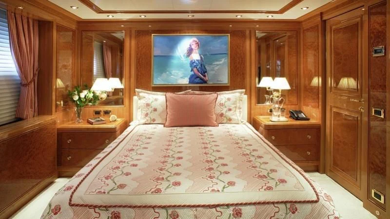 a bed in a room aboard EMELINA Yacht for Sale
