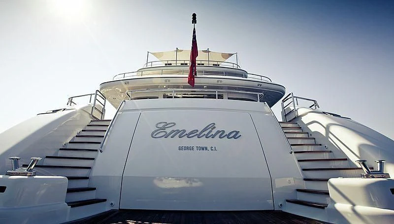 a white boat with a red tower aboard EMELINA Yacht for Sale