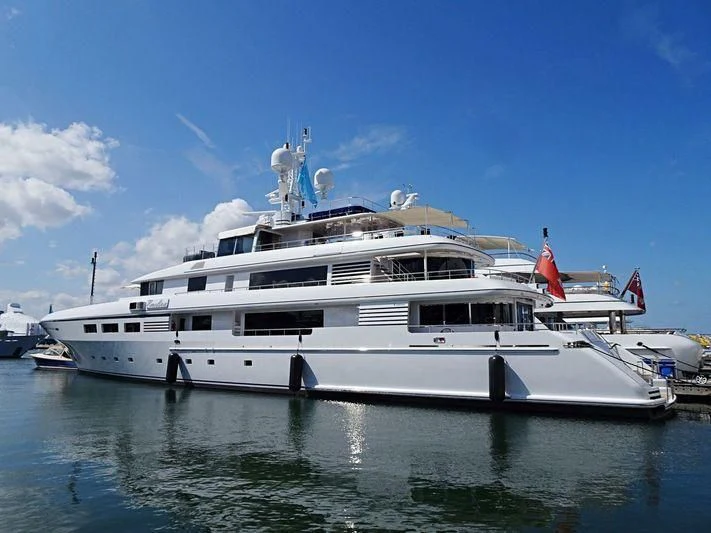 a large white yacht in the water aboard EMELINA Yacht for Sale
