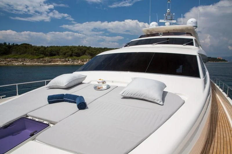 a white yacht on a boat aboard PORTHOS SANS ABRI Yacht for Sale