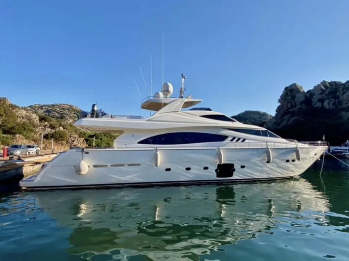 a white boat in the water aboard PORTHOS SANS ABRI Yacht for Sale