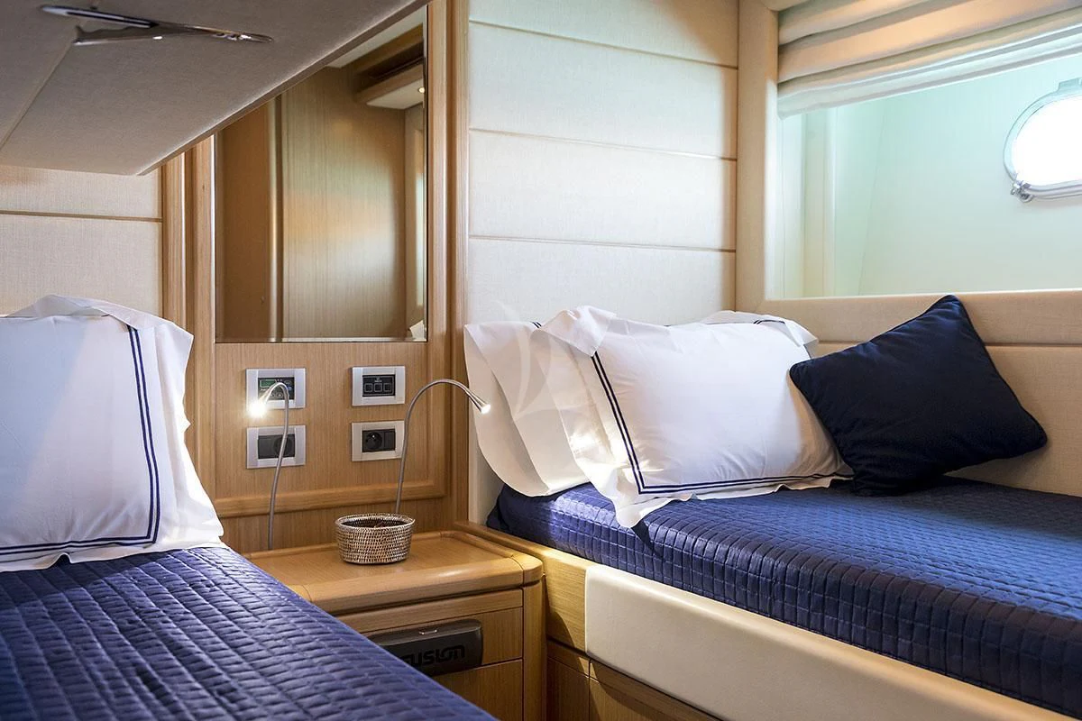 a couple of beds in a room aboard PORTHOS SANS ABRI Yacht for Sale