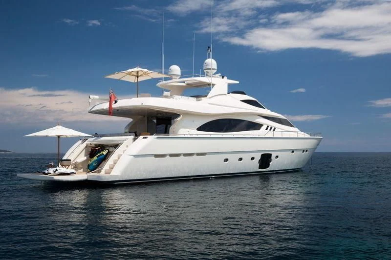 a white yacht in the water aboard PORTHOS SANS ABRI Yacht for Sale