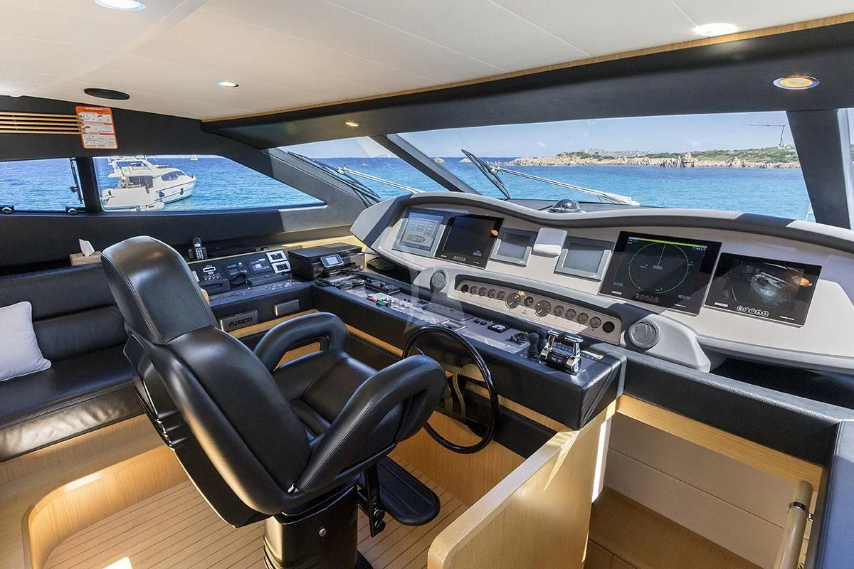 inside of a car aboard PORTHOS SANS ABRI Yacht for Sale