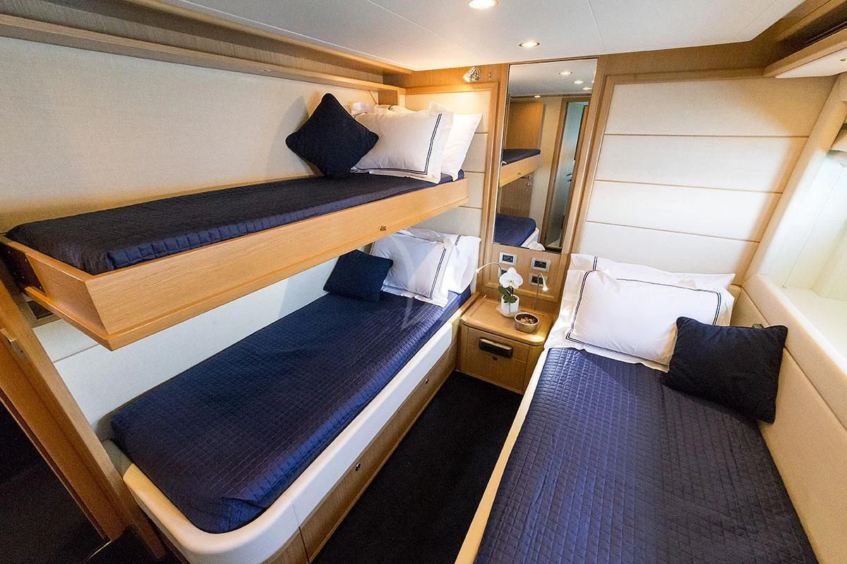 a room with two beds aboard PORTHOS SANS ABRI Yacht for Sale