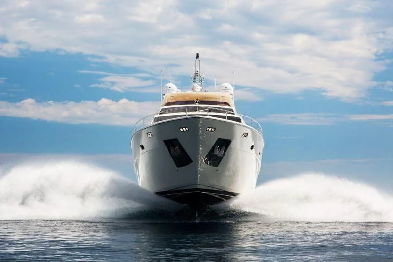 a white ship in the water aboard PORTHOS SANS ABRI Yacht for Sale
