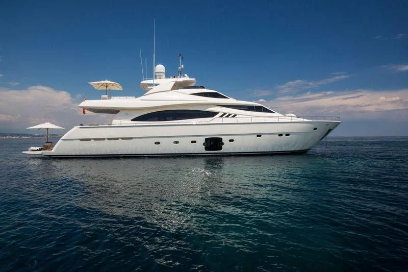 a white yacht in the water aboard PORTHOS SANS ABRI Yacht for Sale