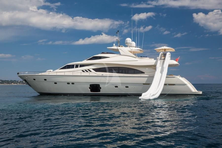 a white yacht in the water aboard PORTHOS SANS ABRI Yacht for Sale
