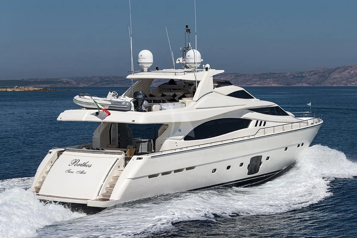 a white yacht on the water aboard PORTHOS SANS ABRI Yacht for Sale