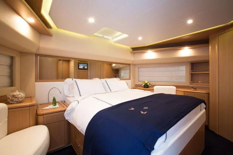 a room with two beds aboard PORTHOS SANS ABRI Yacht for Sale