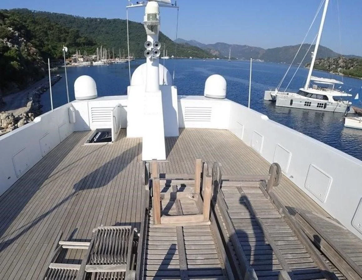 a dock with a statue on it aboard AGA 6 Yacht for Sale