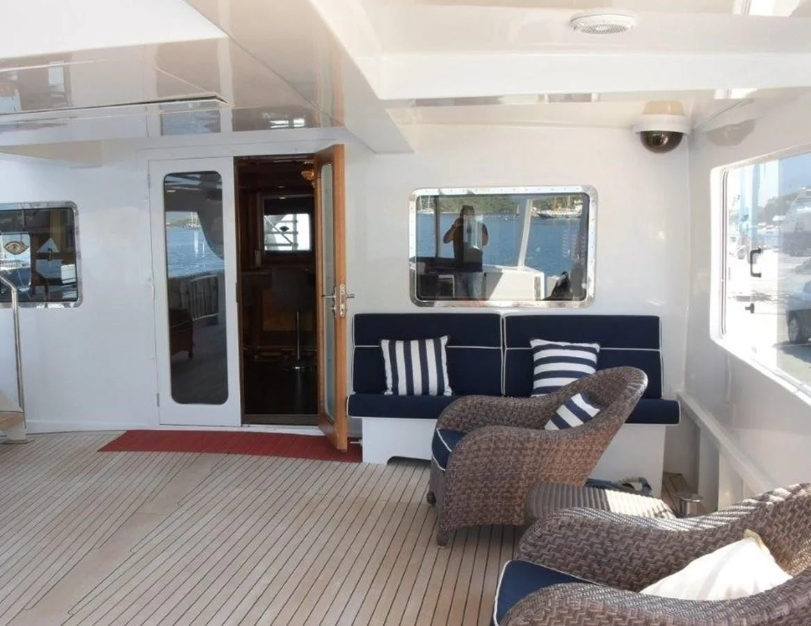 a room with a couch and a television aboard AGA 6 Yacht for Sale