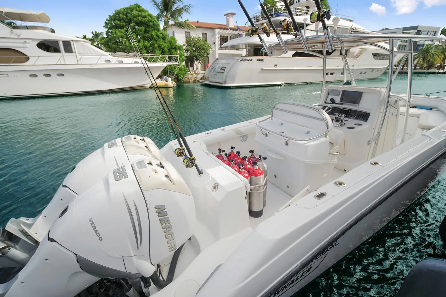 a white boat with red decorations aboard AGA 6 Yacht for Sale