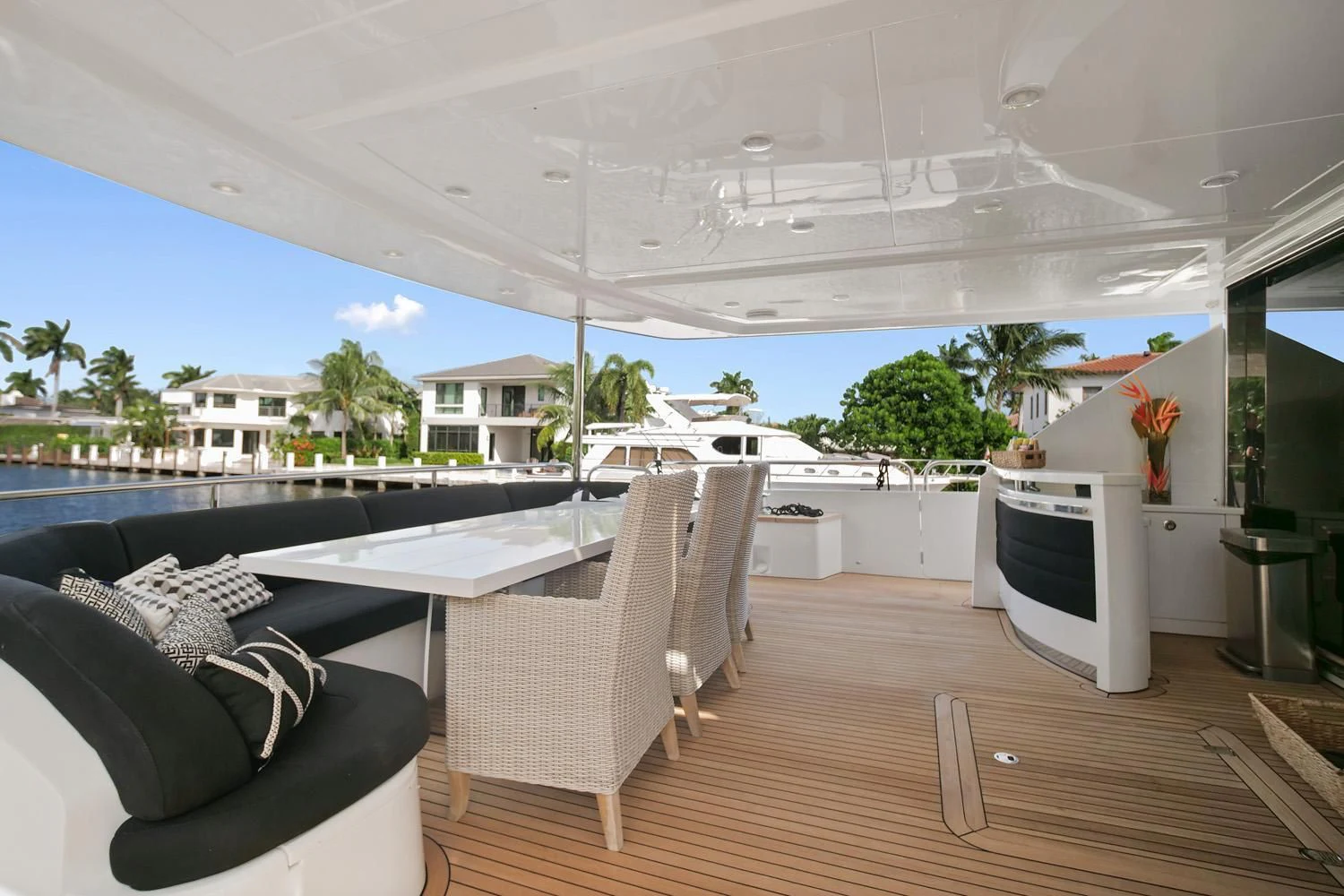 a room with a deck and a television aboard AGA 6 Yacht for Sale