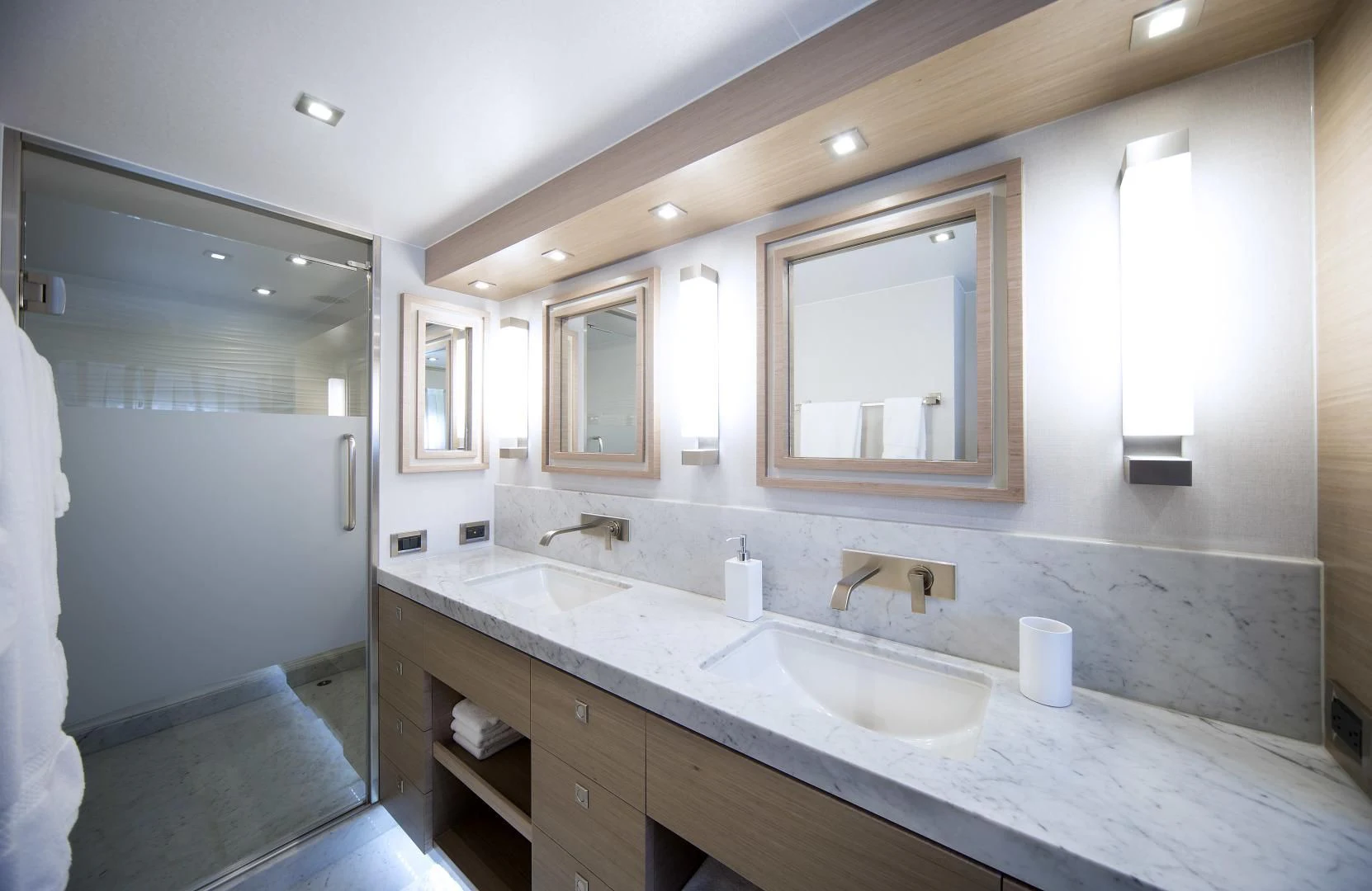 a bathroom with a large mirror aboard SEASEID Yacht for Sale