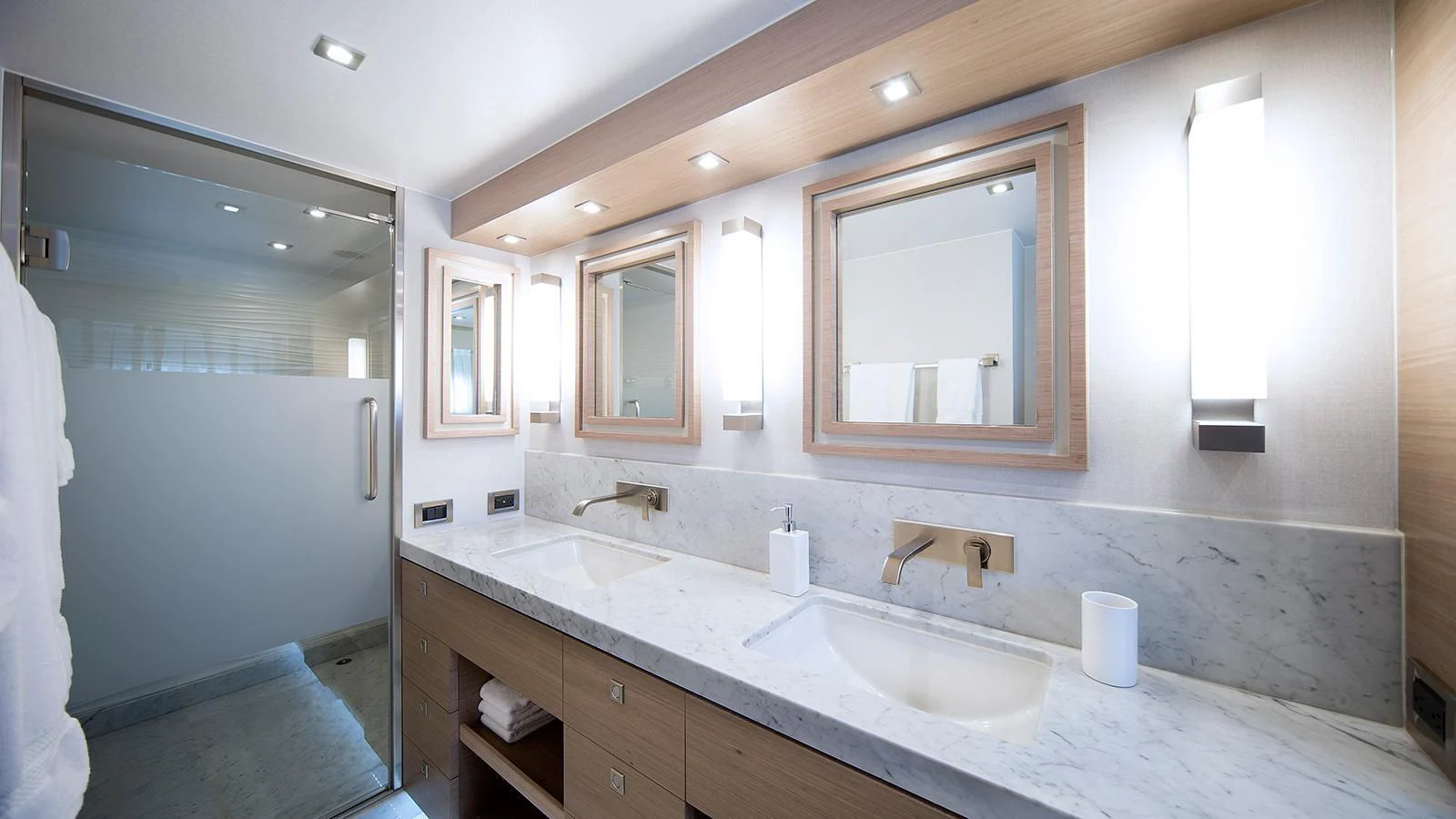 a bathroom with a large mirror aboard SEASEID Yacht for Sale