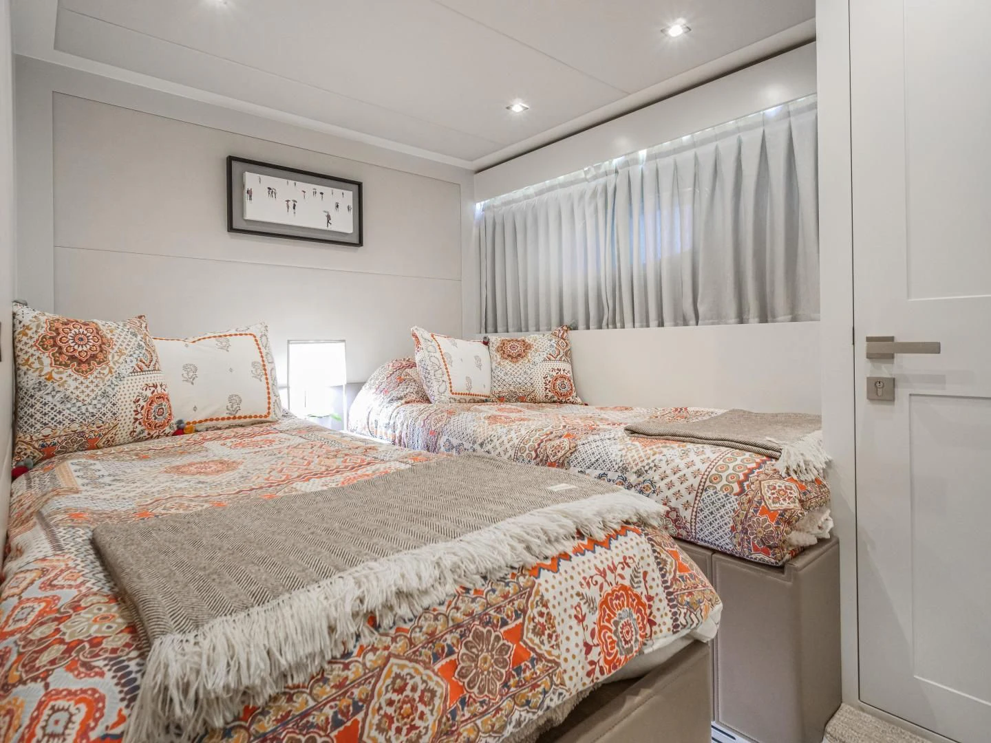 a bedroom with two beds aboard SEASEID Yacht for Sale