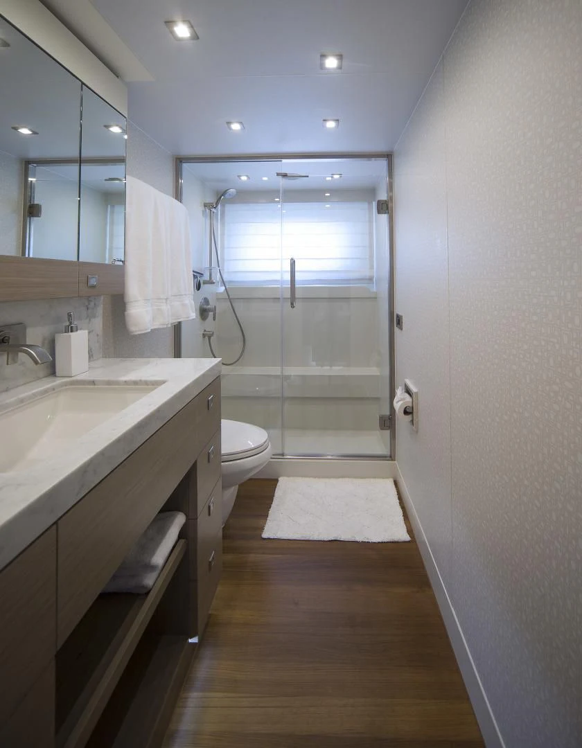 a bathroom with a shower and sink aboard SEASEID Yacht for Sale