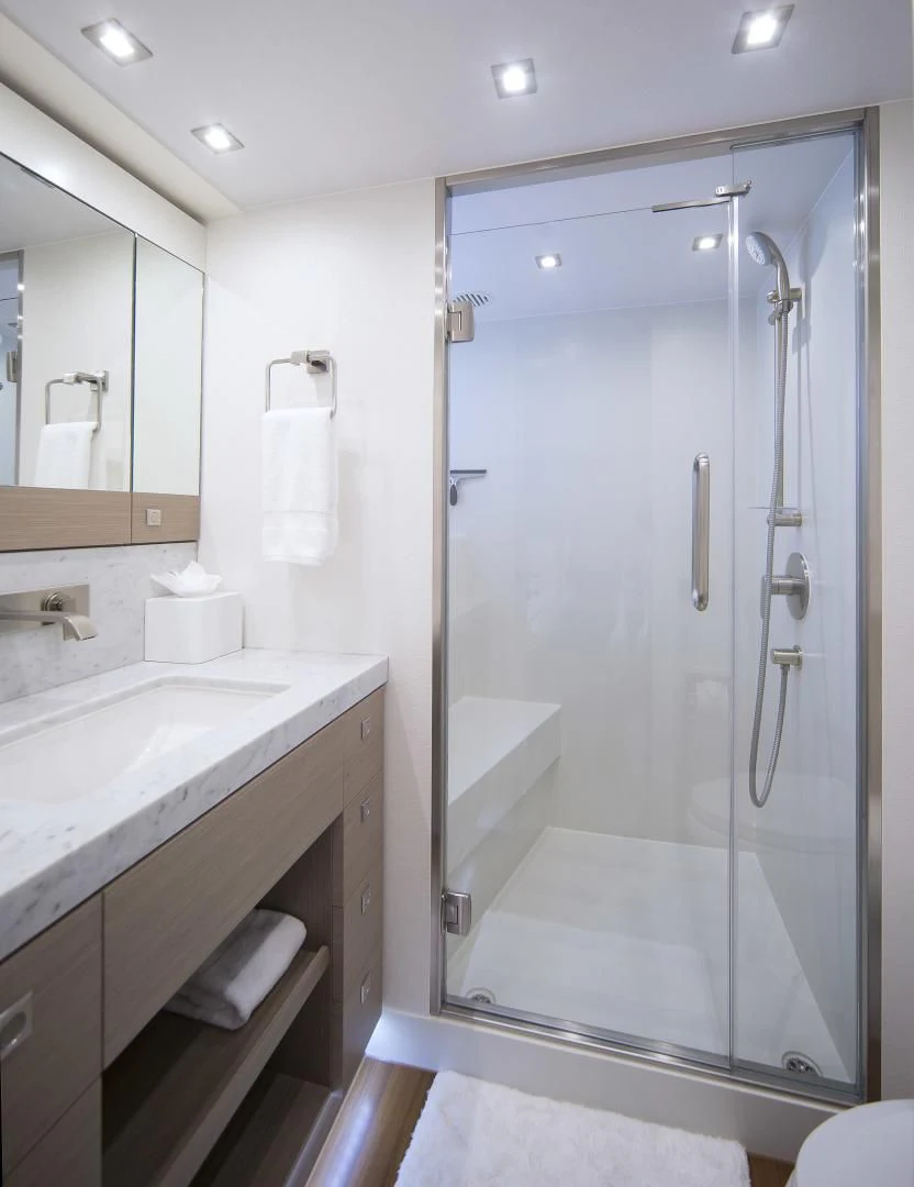 a bathroom with a shower unit and sink aboard SEASEID Yacht for Sale