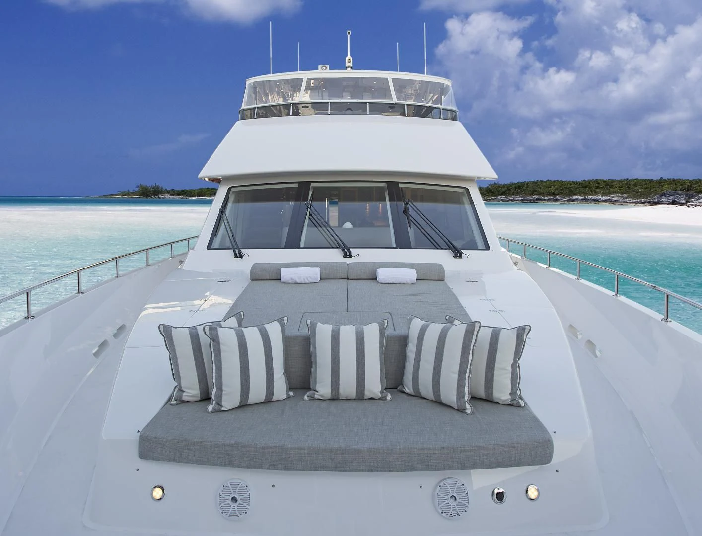 a white boat on a beach aboard SEASEID Yacht for Sale