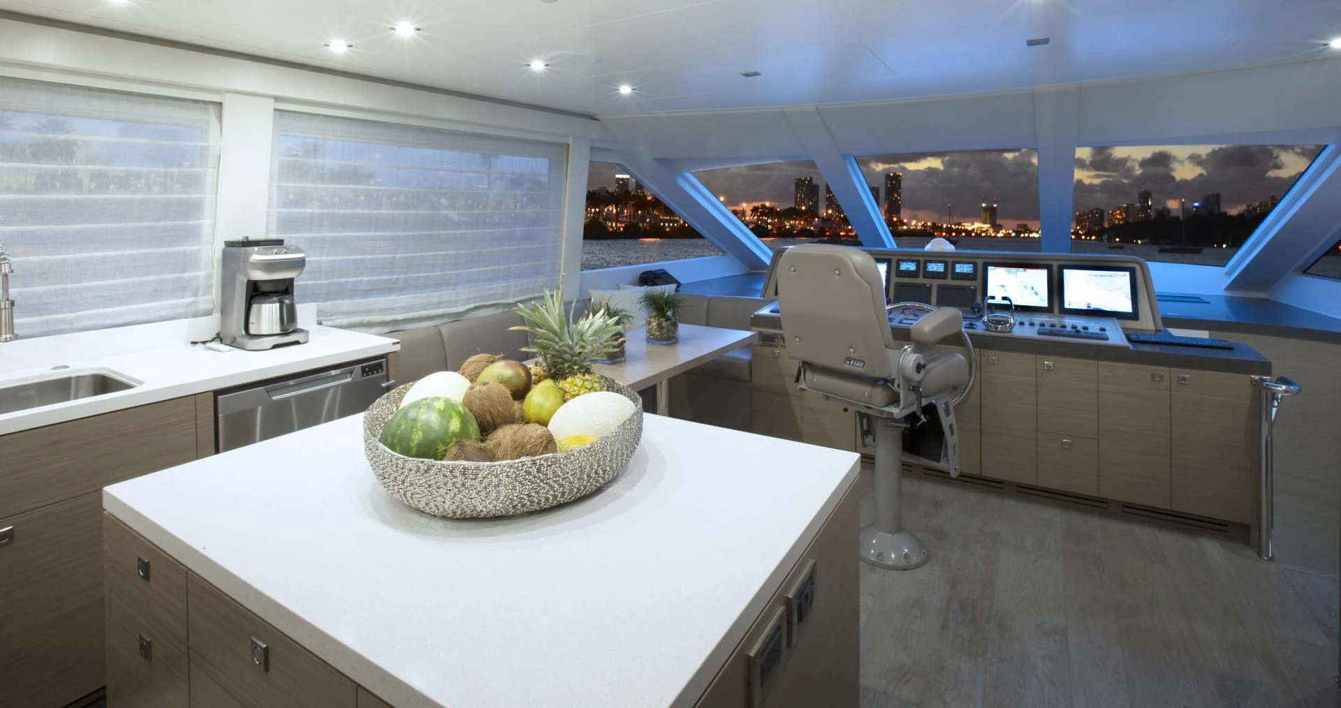 a kitchen with a bowl of fruit aboard SEASEID Yacht for Sale