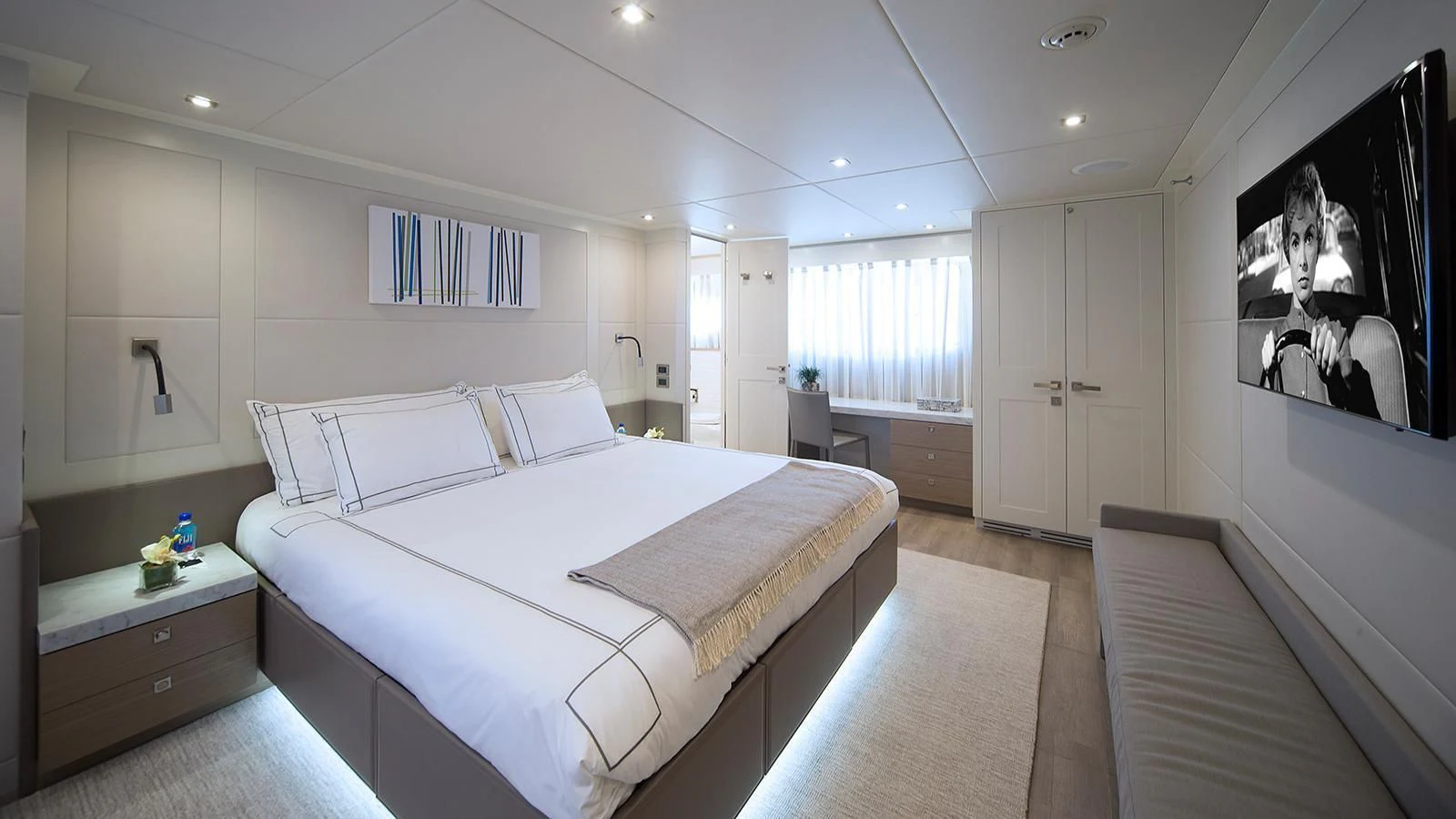 a bedroom with a large bed aboard SEASEID Yacht for Sale
