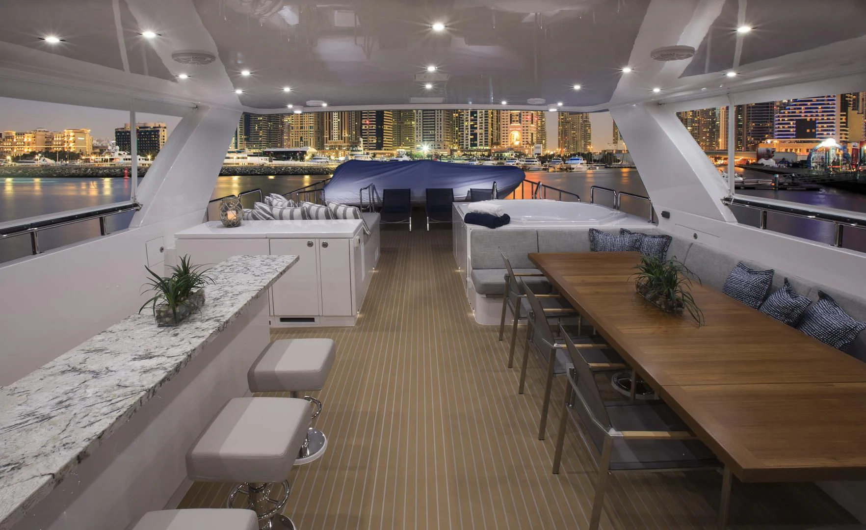 a room with tables and chairs aboard SEASEID Yacht for Sale