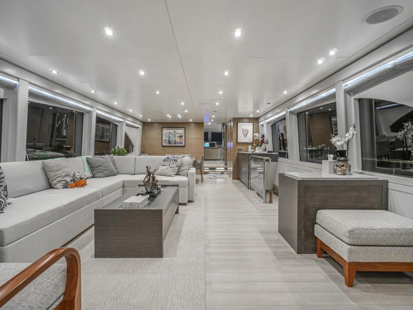 a living room with a white couch aboard SEASEID Yacht for Sale