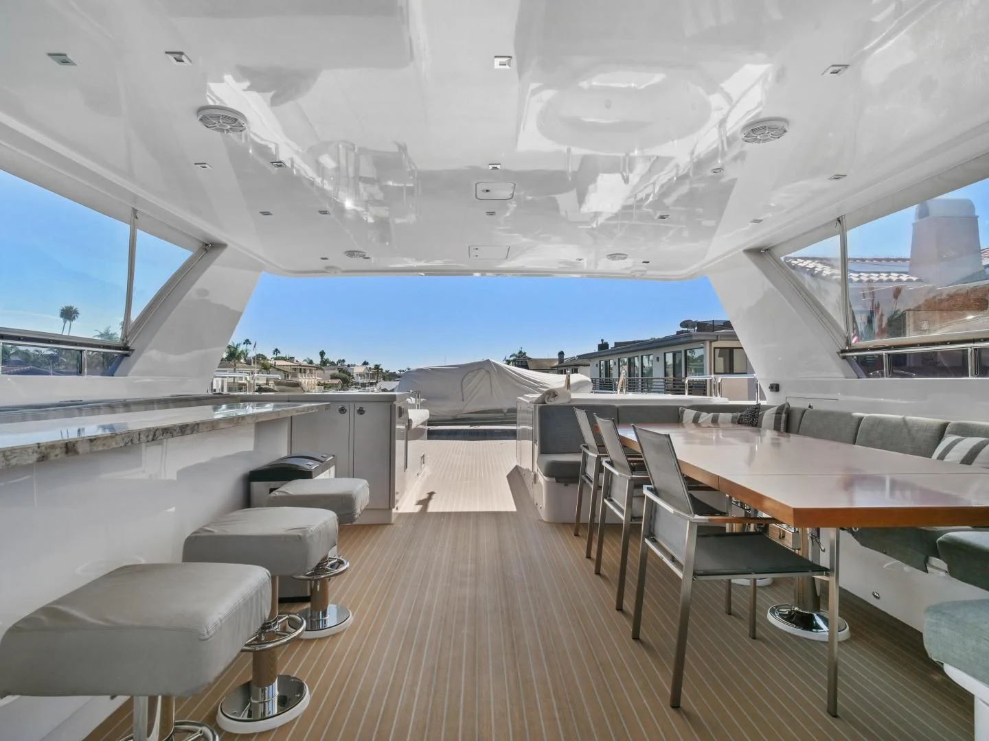 a room with a deck and a view of the water aboard SEASEID Yacht for Sale