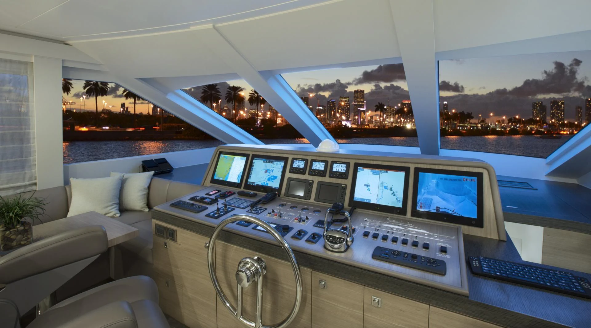 a row of computers on a table aboard SEASEID Yacht for Sale