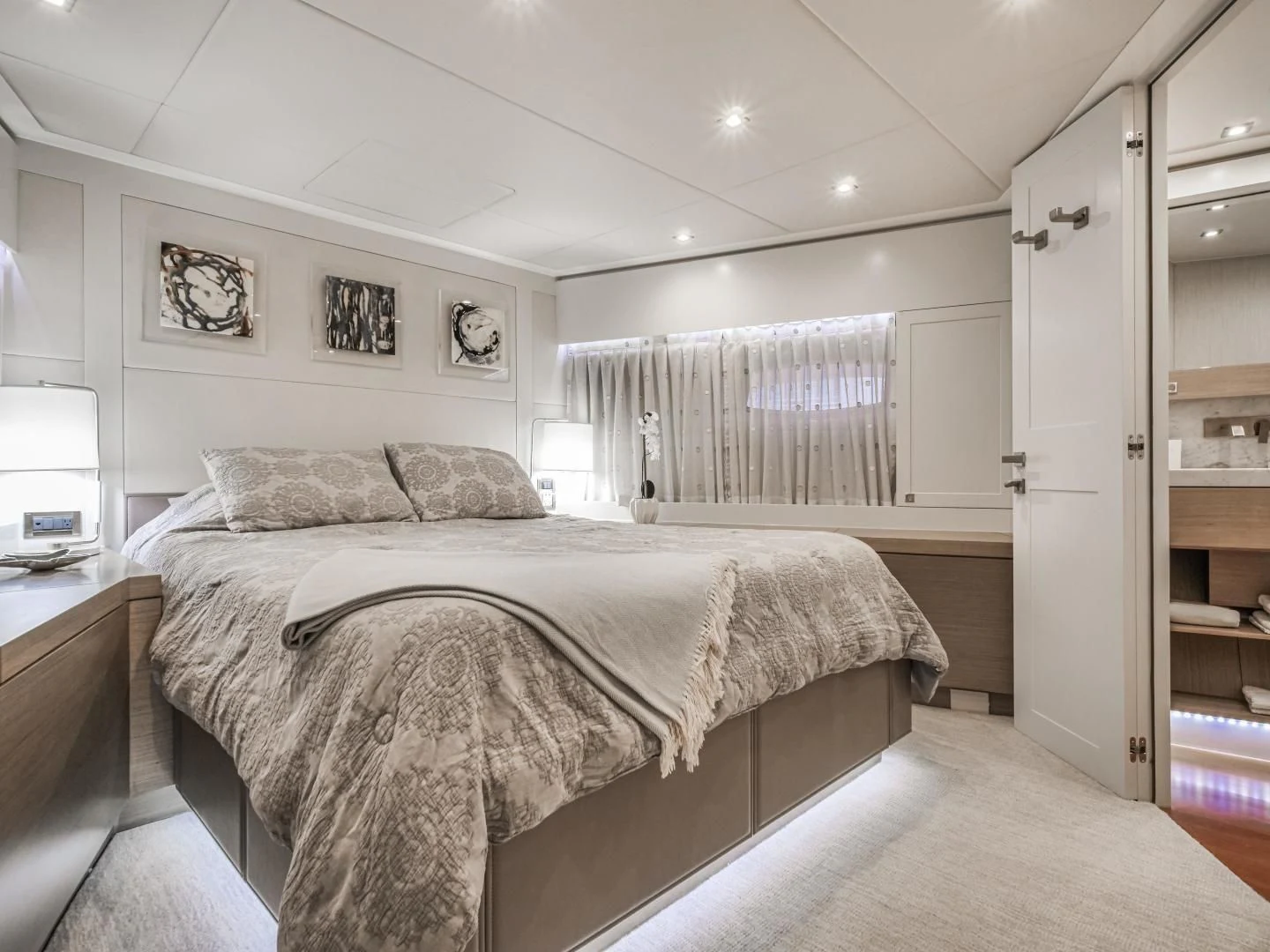 a bedroom with a bed and a desk aboard SEASEID Yacht for Sale
