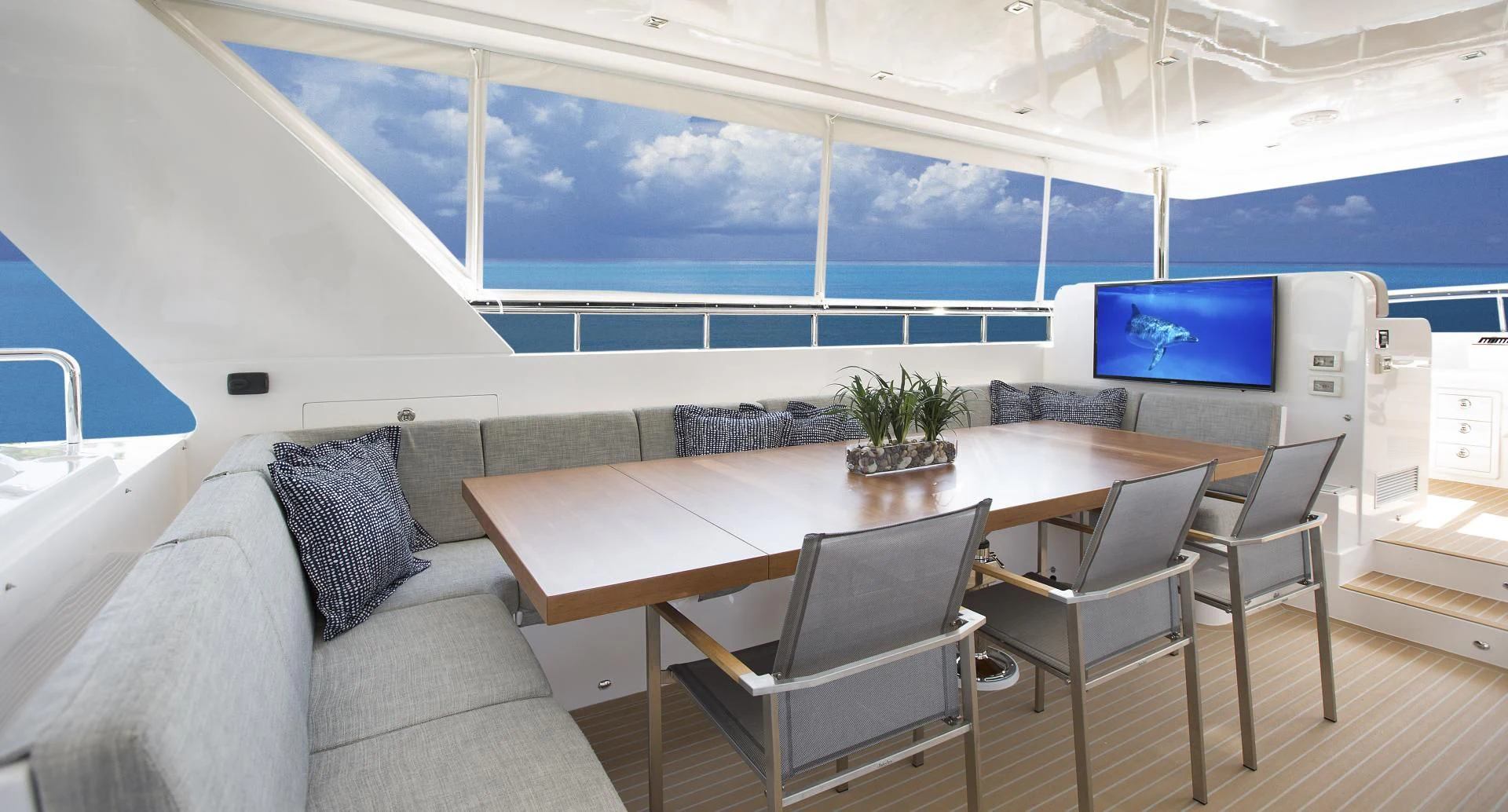 a room with a table and chairs aboard SEASEID Yacht for Sale