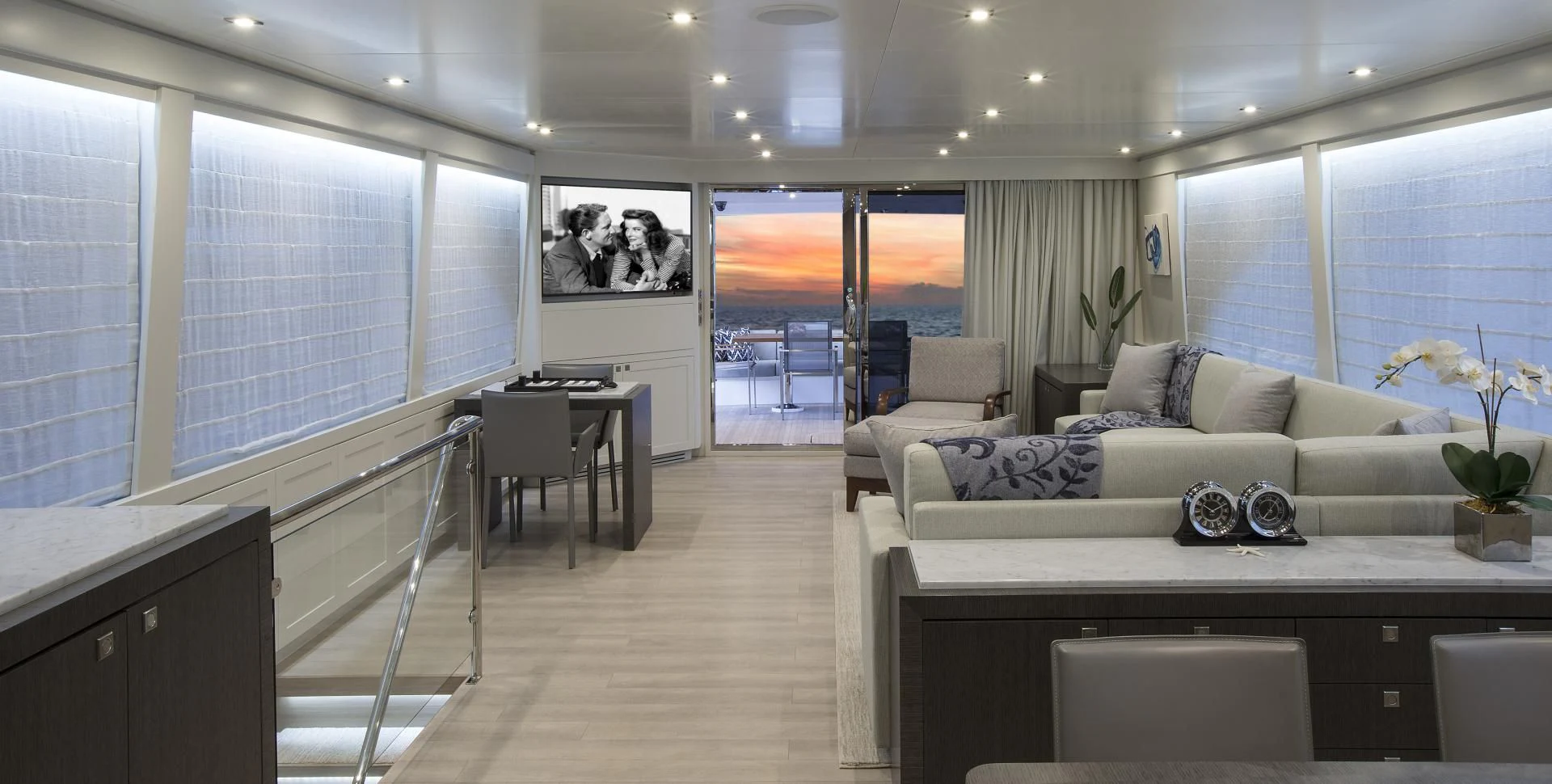 a living room with a large window aboard SEASEID Yacht for Sale