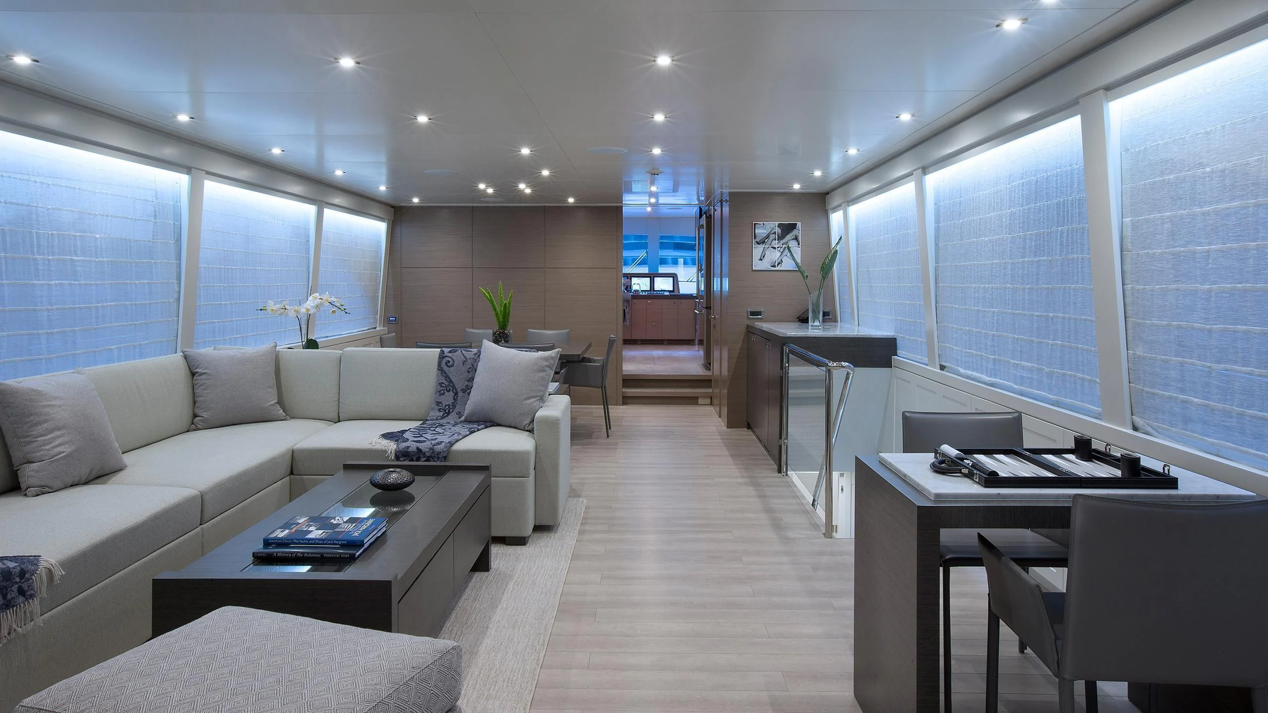 a living room with a couch and a table aboard SEASEID Yacht for Sale