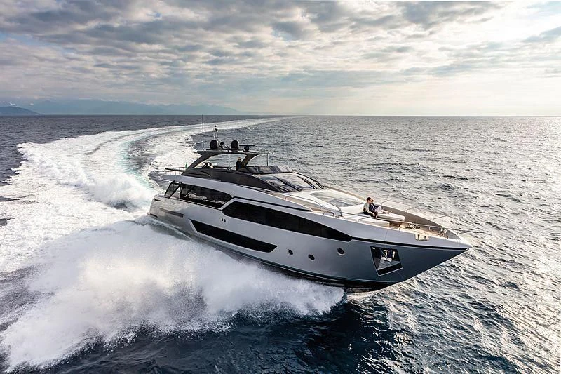 a white boat on water aboard SLAVA Yacht for Sale
