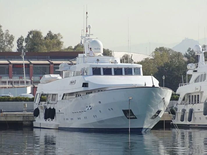 a couple of boats in a harbor aboard TYNDAREO Yacht for Sale