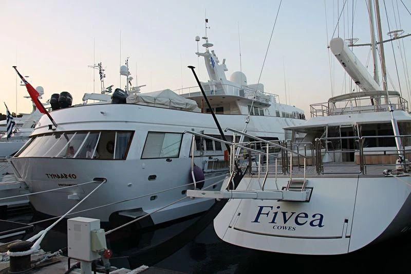 several boats docked at a pier aboard TYNDAREO Yacht for Sale