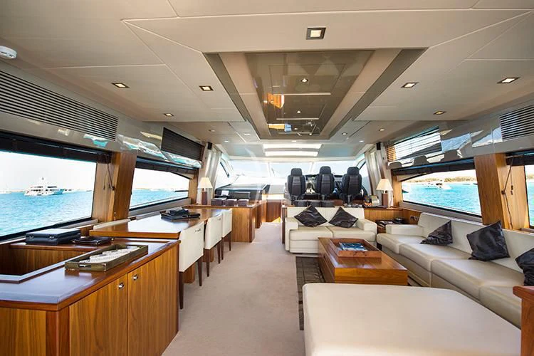 a room with a view of the ocean and the deck aboard NEMESIS Yacht for Sale