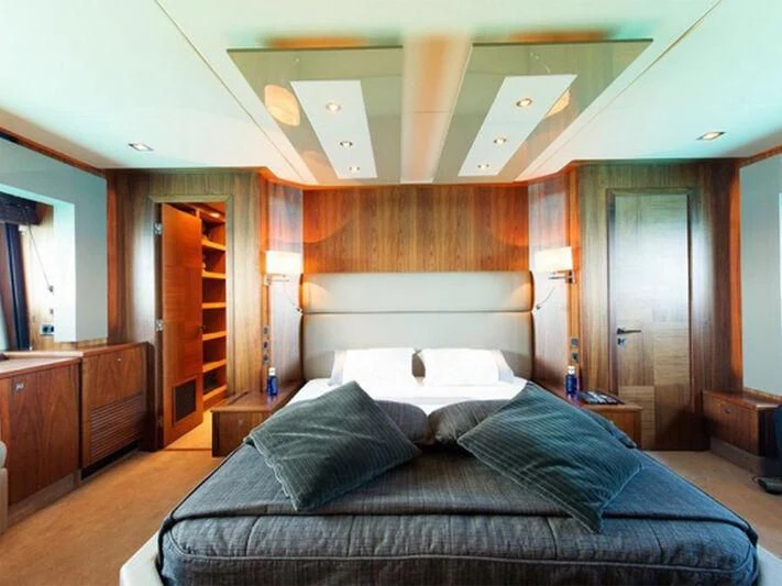 a bed in a room aboard NEMESIS Yacht for Sale