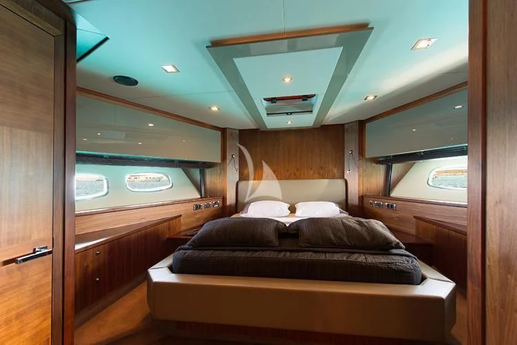 a bed in a room aboard NEMESIS Yacht for Sale