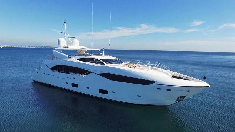 a white yacht in the water aboard RASCAL Yacht for Sale