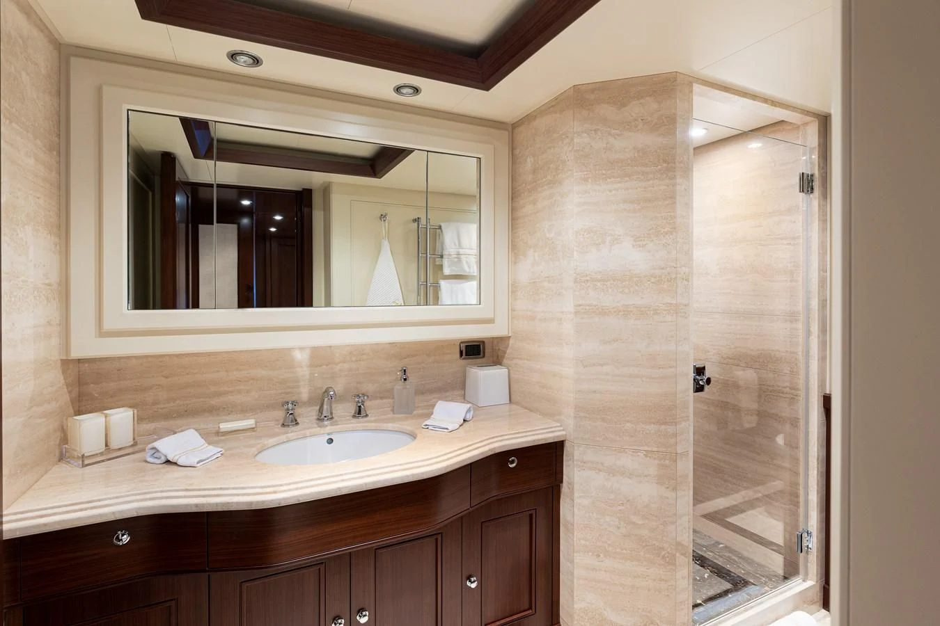 a bathroom with a glass shower aboard PALATIAL Yacht for Sale